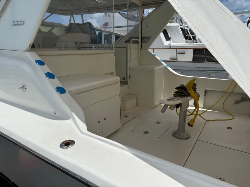 Slide: The Image of 1998 Hatteras 39 Sport Express boat interior with seating and equipment. - 7