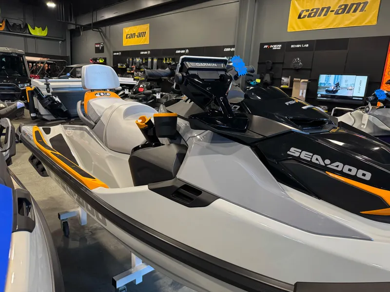 Slide: The Image of 2025 Sea-Doo Fishpro Trophy 170 jet ski displayed in showroom with Can-Am branding. - 4