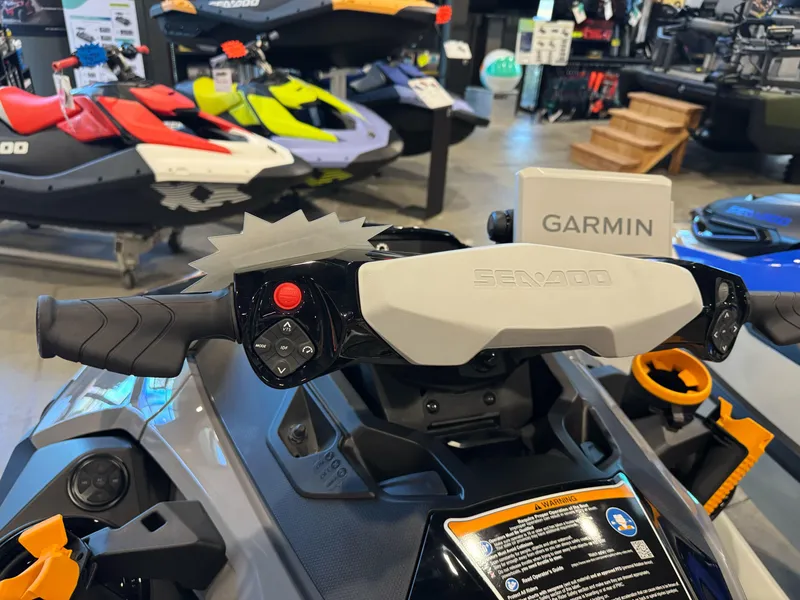 Slide: The Image of 2025 Sea-Doo Fishpro Trophy 170 handlebars with Garmin display in showroom. - 6