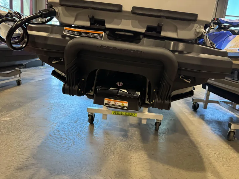 Slide: The Image of 2025 Sea-Doo Fishpro Trophy 170 jet ski on display in showroom. - 8