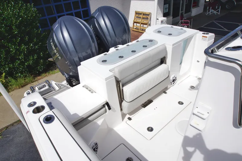 Slide: The Image of 2023 Sea Fox 288 Commander boat deck with Yamaha engines and seating area. - 10