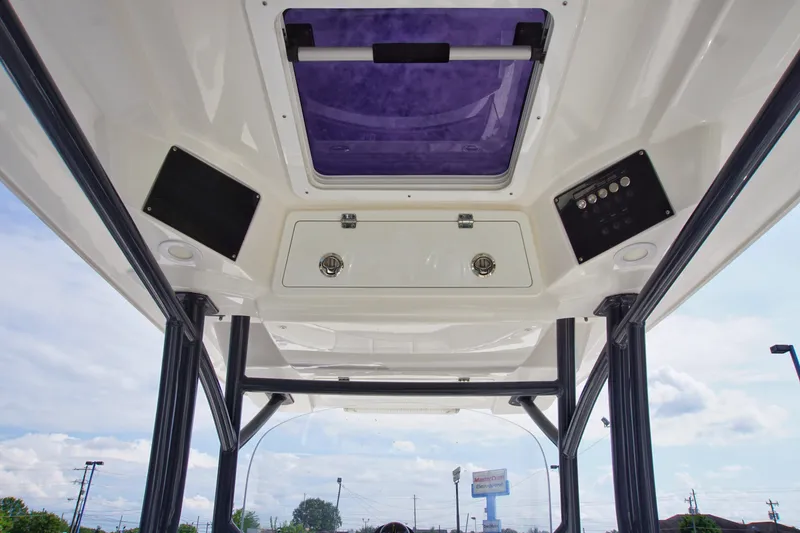 Slide: The Image of 2023 Sea Fox 288 Commander boat interior with overhead console and hatch. - 15