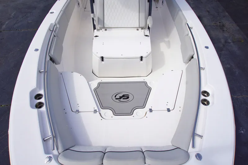 Slide: The Image of 2023 Sea Fox 288 Commander boat interior with cushioned seating and storage compartments. - 7