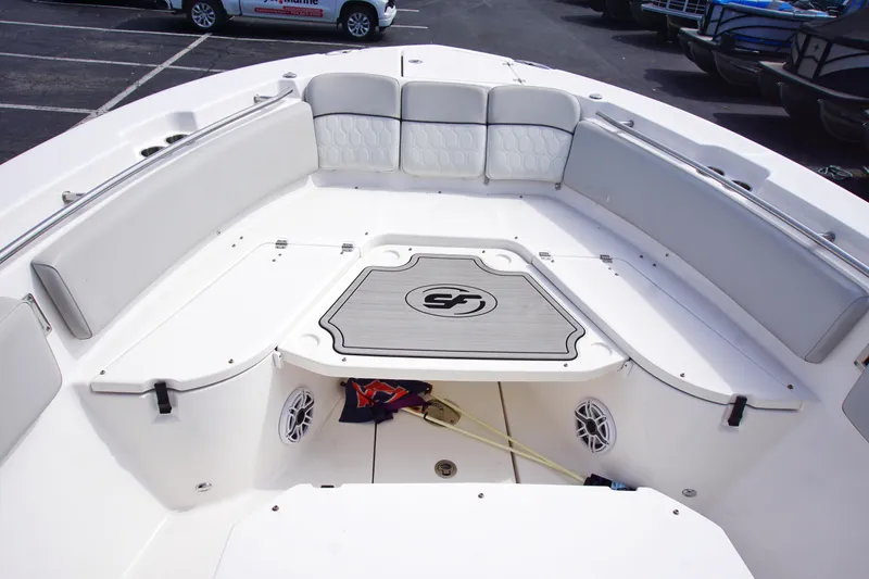 Slide: The Image of 2023 Sea Fox 288 Commander boat interior with seating and storage compartments. - 8