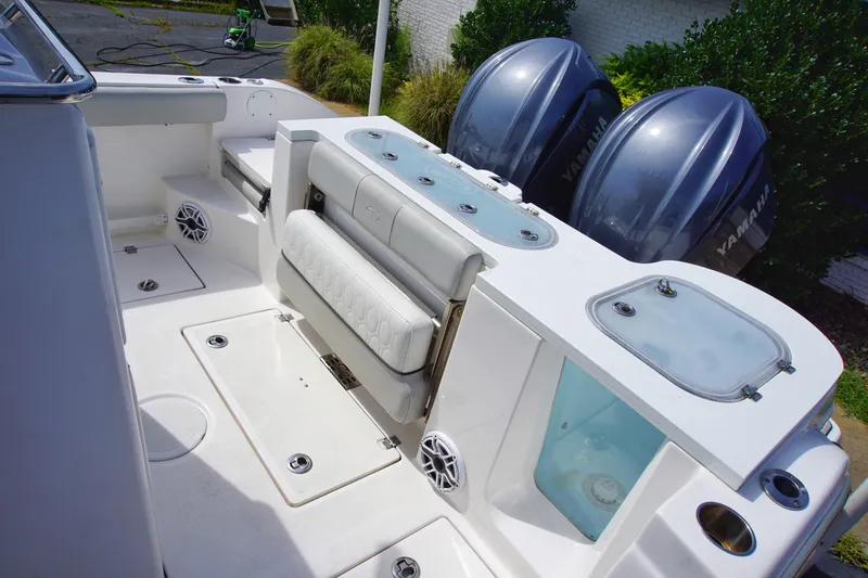 Slide: The Image of 2023 Sea Fox 288 Commander boat interior with Yamaha engines and seating area. - 9