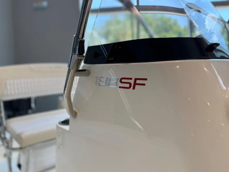 Slide: The Image of 2026 Scout 188 SF boat interior with logo and seating detail. - 10