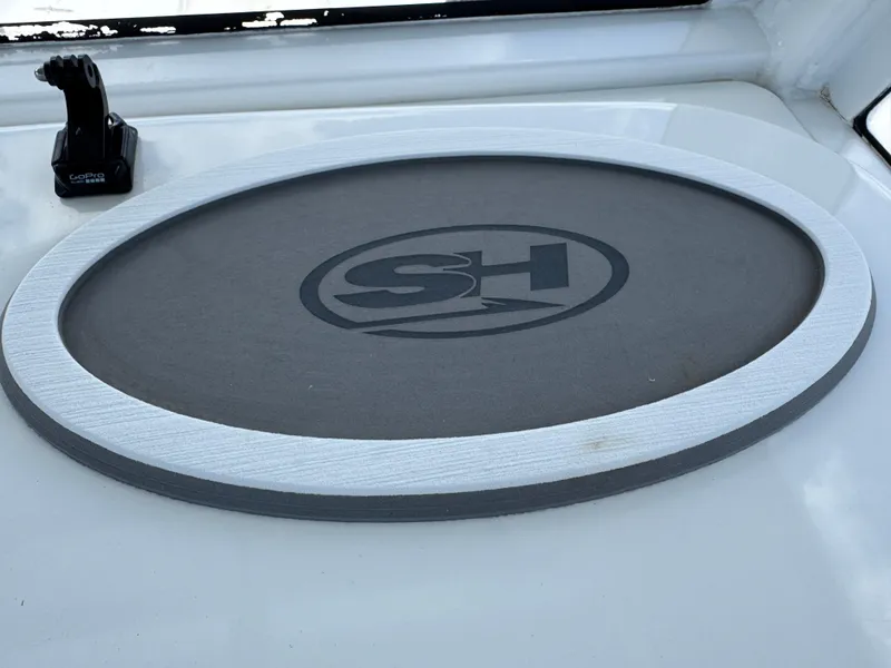 Slide: The Image of 2019 Sea Hunt Ultra 275 SE logo on boat deck with GoPro mount. - 31