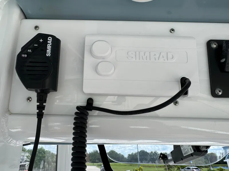 Slide: The Image of Simrad marine equipment on 2019 Sea Hunt Ultra 275 SE boat dashboard. - 34