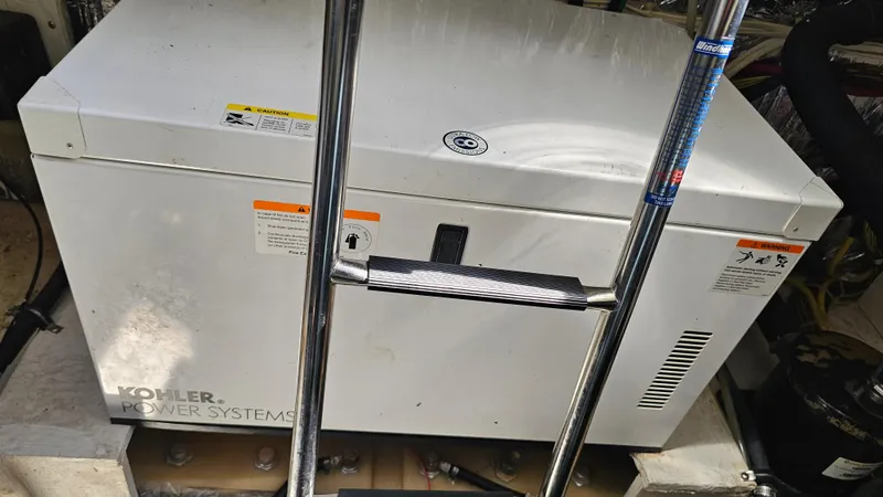 Slide: The Image of Kohler power system in 2009 Bayliner 340 SB boat engine room. - 30