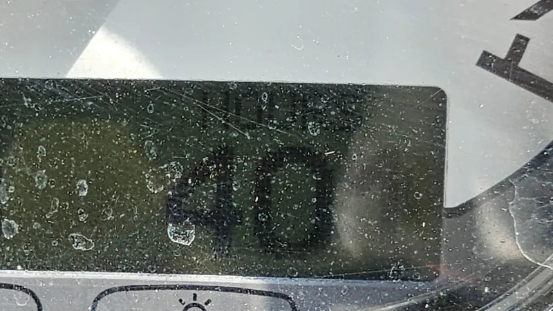 Slide: The Image of Digital display on a 2009 Bayliner 340 SB boat dashboard, showing the number 40. - 31
