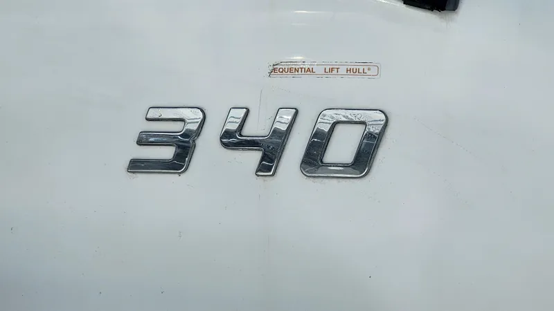 Slide: The Image of Bayliner 340 SB 2009 boat emblem with sequential lift hull feature. - 33