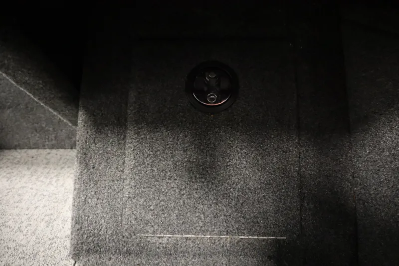 Slide: The Image of Carpeted interior of 2023 Tracker V16 Pro Guide WT boat. - 18