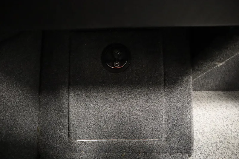 Slide: The Image of Carpeted interior detail of 2023 Tracker V16 Pro Guide WT boat. - 25