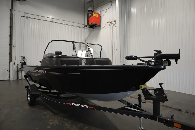 Slide: The Image of 2023 Tracker V16 Pro Guide WT boat in indoor storage. - 43