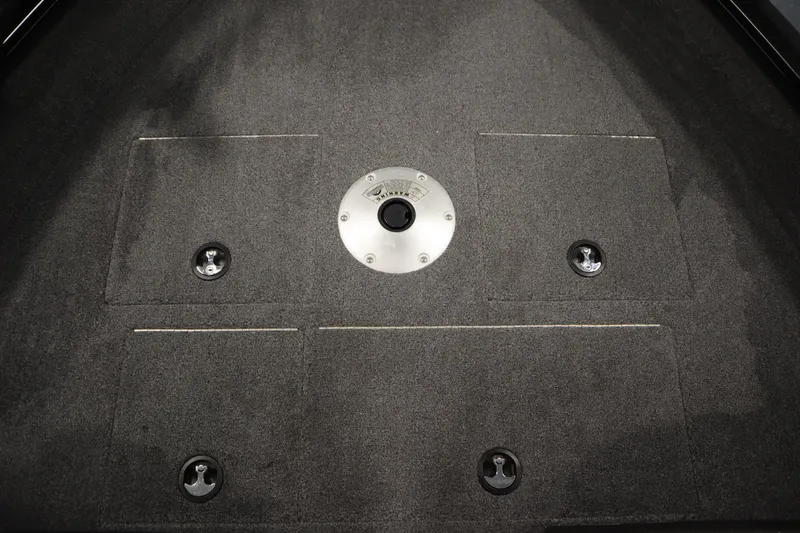 Slide: The Image of 2023 Tracker V16 Pro Guide WT boat deck with storage compartments. - 6