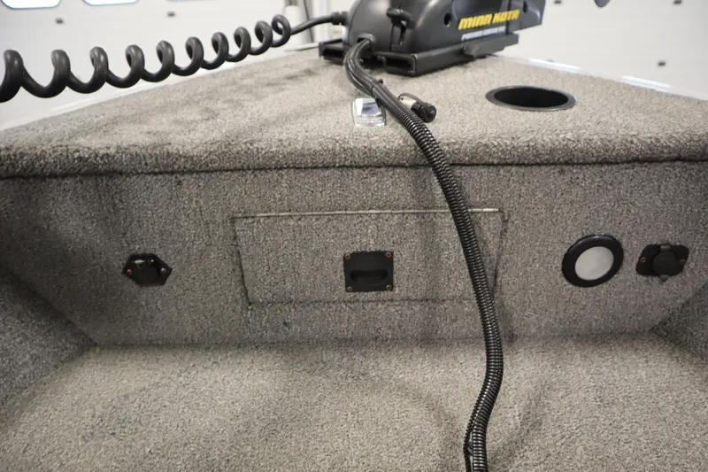 Slide: The Image of 2013 Alumacraft 165 Classic SC boat interior with Minn Kota trolling motor. - 14