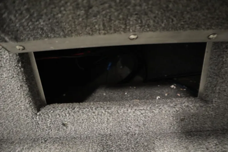 Slide: The Image of Carpeted storage compartment in 2013 Alumacraft 165 Classic SC boat. - 15