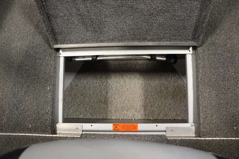 Slide: The Image of 2013 Alumacraft 165 Classic SC boat interior storage compartment. - 17