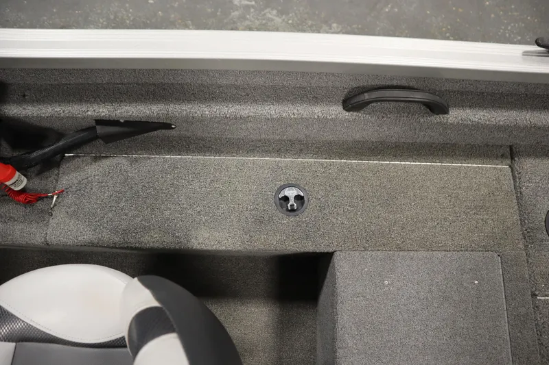 Slide: The Image of Interior view of 2013 Alumacraft 165 Classic SC boat, featuring carpeted flooring and seating. - 38