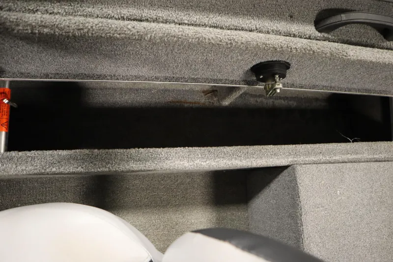 Slide: The Image of 2013 Alumacraft 165 Classic SC boat interior storage compartment. - 39