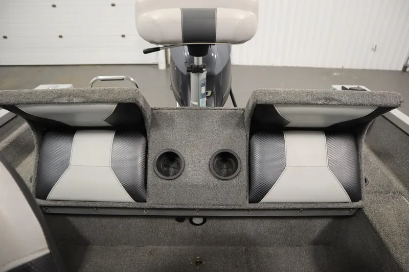 Slide: The Image of 2013 Alumacraft 165 Classic SC boat interior with storage compartments and seating. - 41