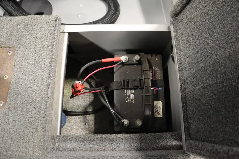 Slide: The Image of Battery compartment of 2013 Alumacraft 165 Classic SC boat. - 44