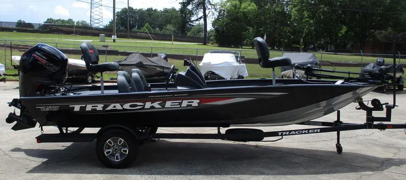 Slide: The Image of 2026 Tracker Pro Team™ 190 boat on trailer, parked outdoors, side view. - 3
