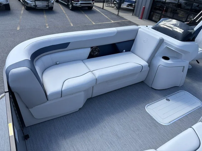 Slide: The Image of 2026 Godfrey SWEETWATER 2286 SFL boat interior with sleek seating and modern design. - 10