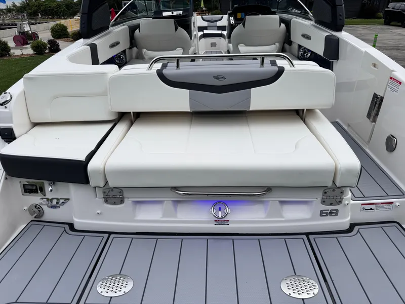 Slide: The Image of 2025 Chaparral 307 SSX boat interior with luxurious seating and modern design. - 21