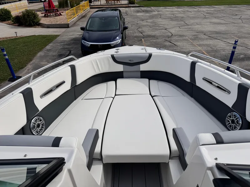 Slide: The Image of 2025 Chaparral 307 SSX boat interior with luxurious seating and modern design. - 28