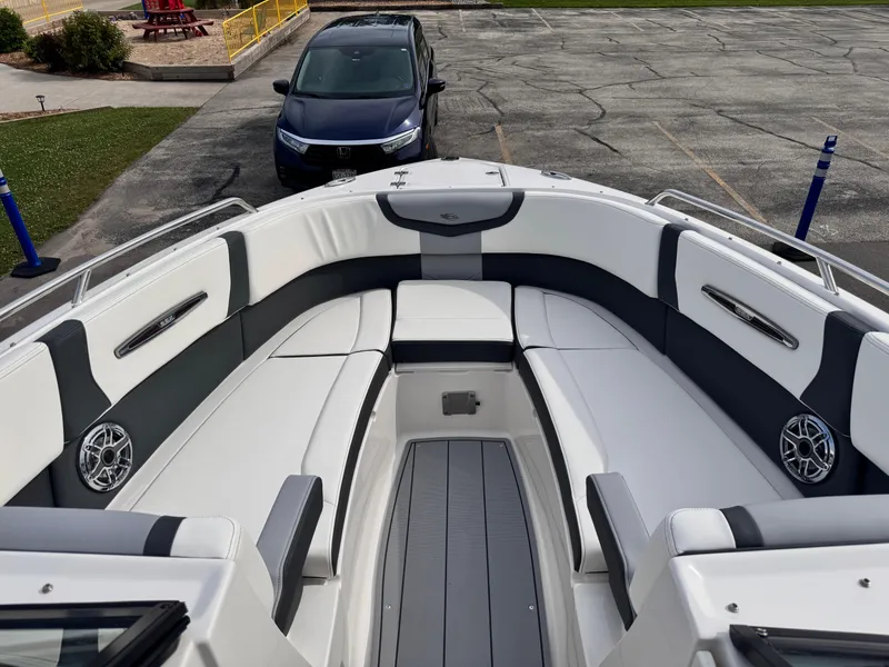 Slide: The Image of 2025 Chaparral 307 SSX boat interior with spacious seating and modern design. - 29