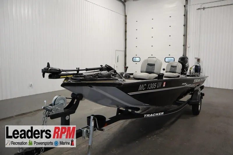 The Image of 2018 Tracker Panfish 16 boat on trailer in indoor showroom. - 1