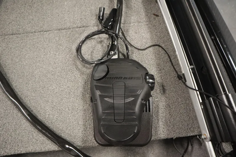 Slide: The Image of Foot pedal control on 2018 Tracker Panfish 16 boat carpeted floor. - 14