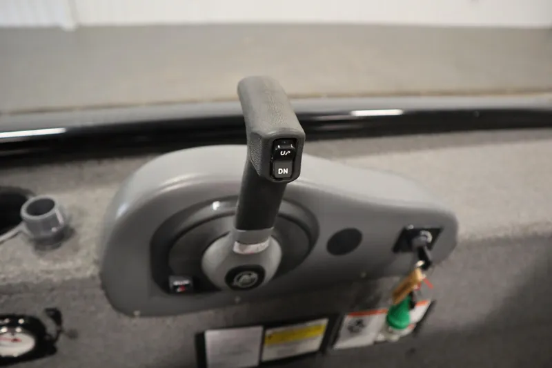 Slide: The Image of 2018 Tracker Panfish 16 boat throttle control with up and down buttons. - 18
