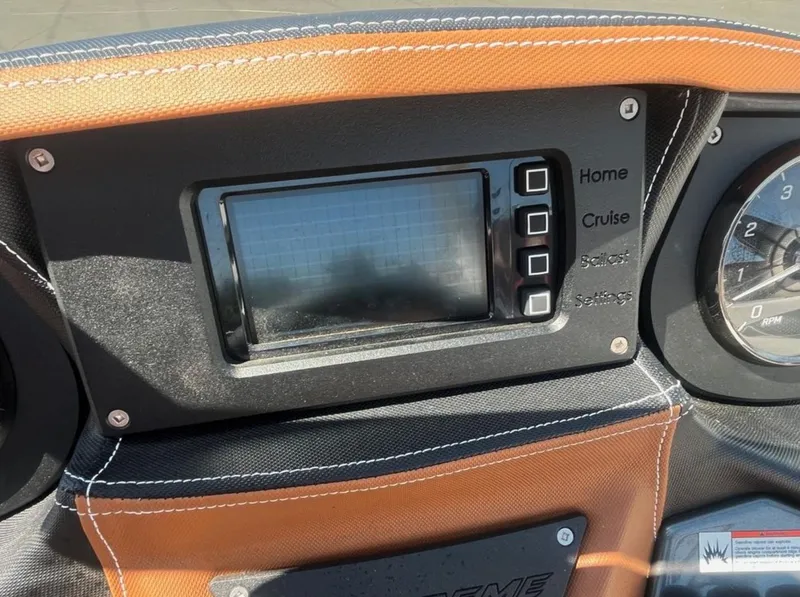 Slide: The Image of Dashboard of a 2021 Supreme S 238 boat with touchscreen and control buttons. - 19