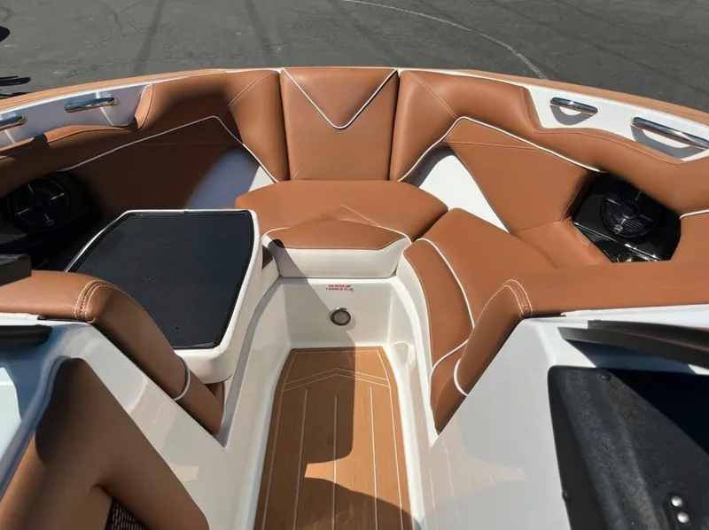 Slide: The Image of Luxurious interior of 2021 Supreme S 238 boat with tan leather seating. - 24