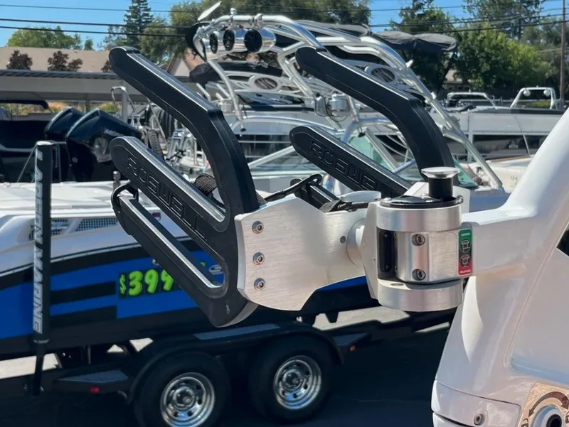Slide: The Image of Boat accessory on Supreme s 238, 2021 model, with Roswell branding, in a marina setting. - 29