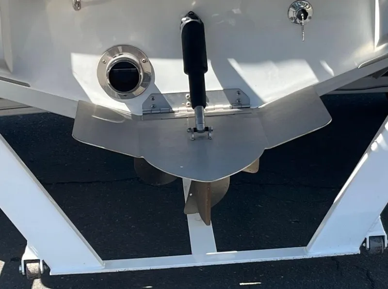Slide: The Image of Rear view of a 2021 Supreme S 238 boat, showcasing the propeller and rudder. - 3