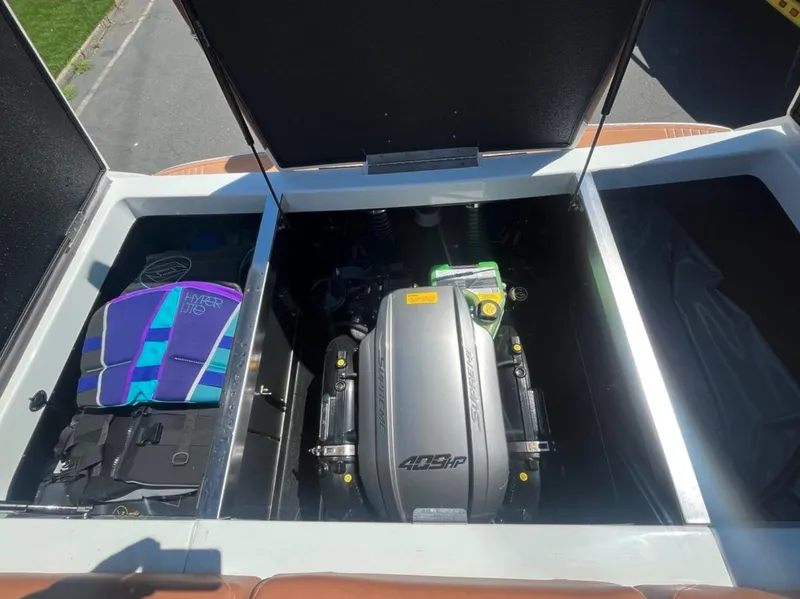 Slide: The Image of Open engine compartment of 2021 Supreme S 238 boat with life jackets. - 6