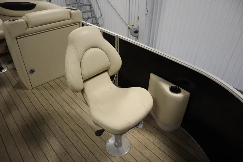 Slide: The Image of Beige seating on 2019 Sylvan 820 Mirage boat with cup holder and wood flooring. - 16