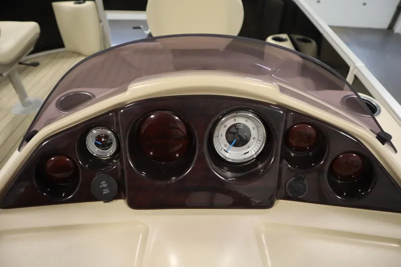 Slide: The Image of Dashboard of 2019 Sylvan 820 Mirage boat with gauges and controls. - 21