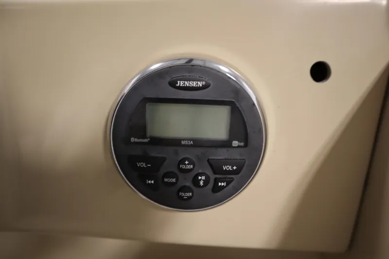 Slide: The Image of Jensen MS3A stereo system on 2019 Sylvan 820 Mirage boat dashboard. - 23