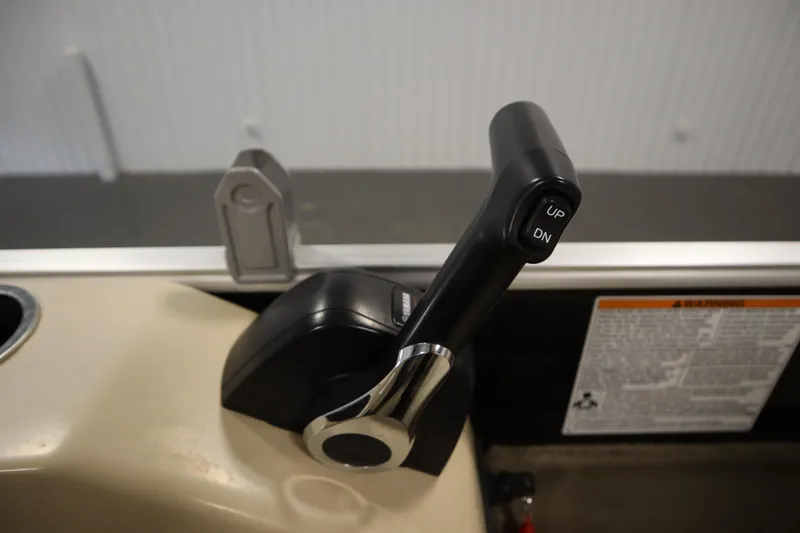 Slide: The Image of Throttle control lever on a 2019 Sylvan 820 Mirage boat. - 24