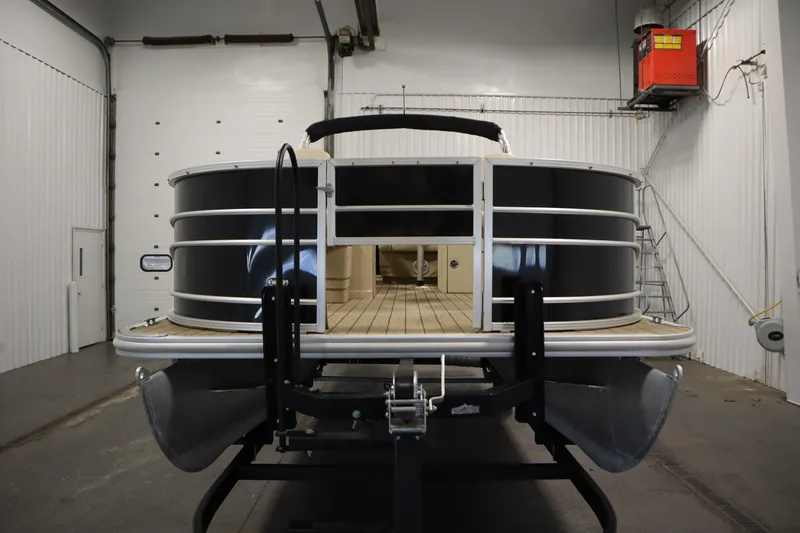 Slide: The Image of 2019 Sylvan 820 Mirage pontoon boat in a storage facility. - 3