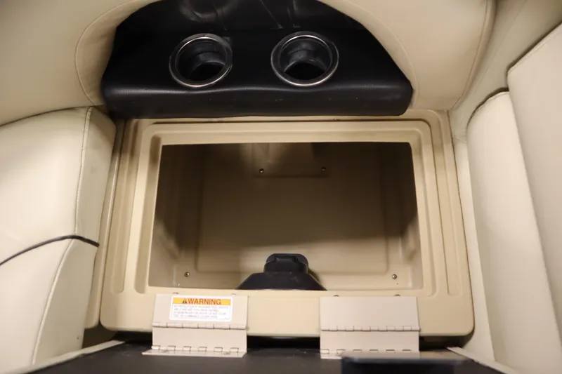 Slide: The Image of Interior storage compartment of 2019 Sylvan 820 Mirage boat with cup holders. - 30