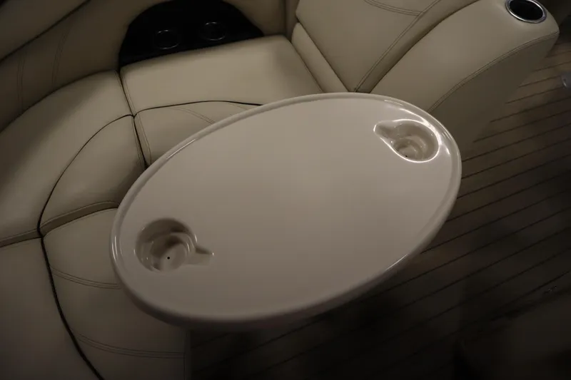 Slide: The Image of Luxurious seating and table on 2019 Sylvan 820 Mirage boat interior. - 33