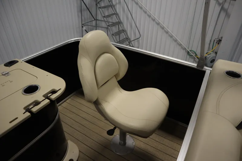 Slide: The Image of Beige captain's chair on 2019 Sylvan 820 Mirage boat, featuring sleek design and cup holders. - 37
