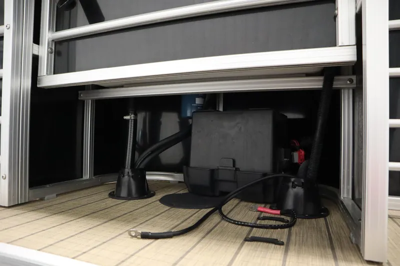 Slide: The Image of 2019 Sylvan 820 Mirage boat interior wiring and battery compartment. - 42