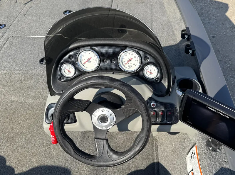 Slide: The Image of 2016 Tracker Pro Team 175 TF dashboard with steering wheel and gauges. - 18