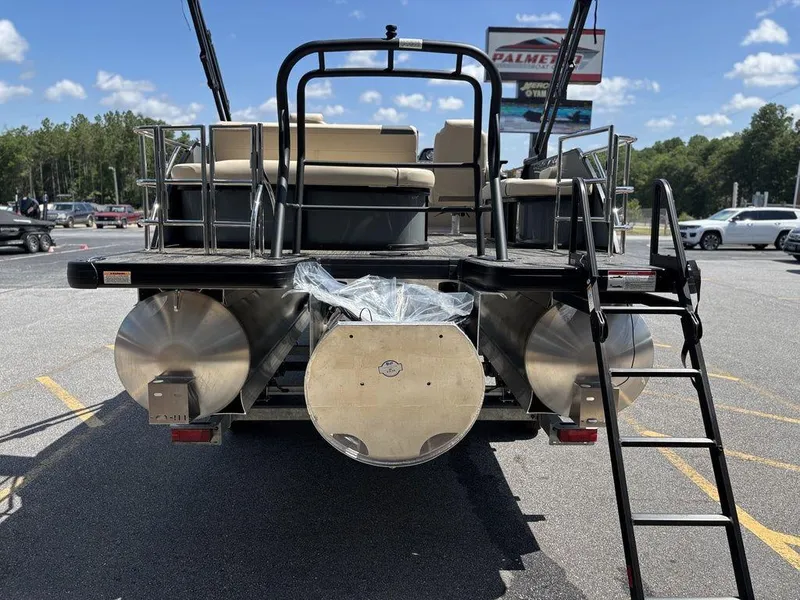 Slide: The Image of 2026 Godfrey SWEETWATER 2286 SFL pontoon boat rear view in parking lot. - 4